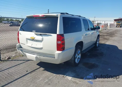 2014 Chevrolet Suburban 1500 Ltz z USA, uszkodzony, nr VIN 1GNSCKE0XER235343